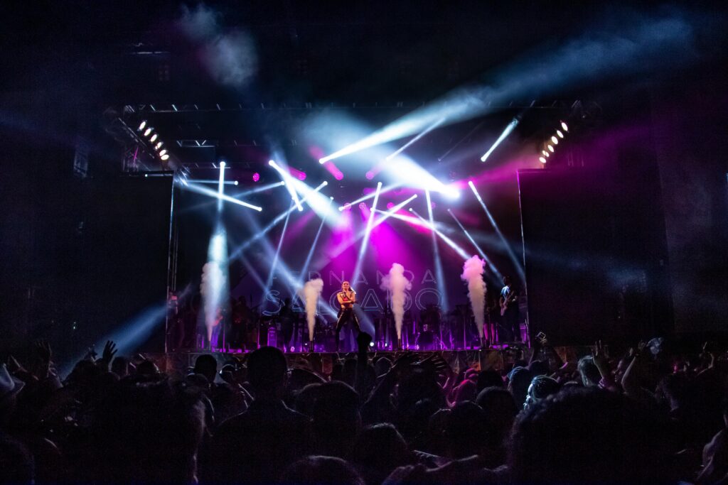 A thrilling live concert with dynamic lighting and a lively audience at a music event in São Paulo, Brazil.